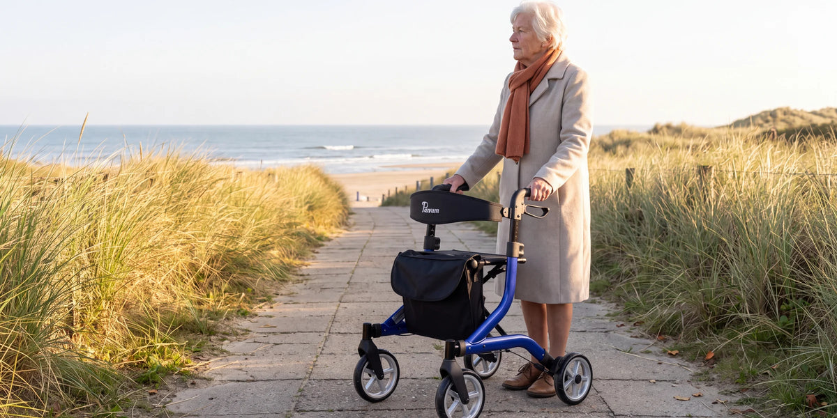 Parvum SuperLight in blue on a path through the dunes in the low sun; a woman stops for a moment.
